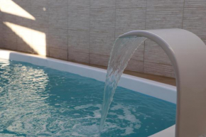 Casa ampla e agradável com piscina e churrasqueira